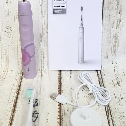 Philips Sonicare 4100 Electric Toothbrush, Sonic Toothbrush with Two Intensity Levels, Pressure Sensor and Timer, Lush Lilac Prismatic, Model HX3689/24