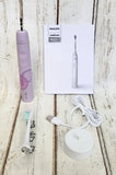 Philips Sonicare 4100 Electric Toothbrush, Sonic Toothbrush with Two Intensity Levels, Pressure Sensor and Timer, Lush Lilac Prismatic, Model HX3689/24